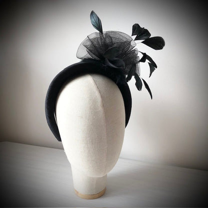 Fascinator black on a black velvet headband with soft feathers and a black swirl rose MHB13