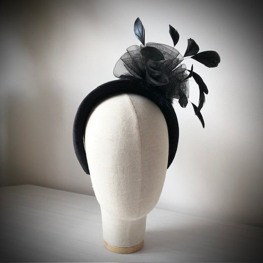 Fascinator black on a black velvet headband with soft feathers and a black swirl rose MHB13